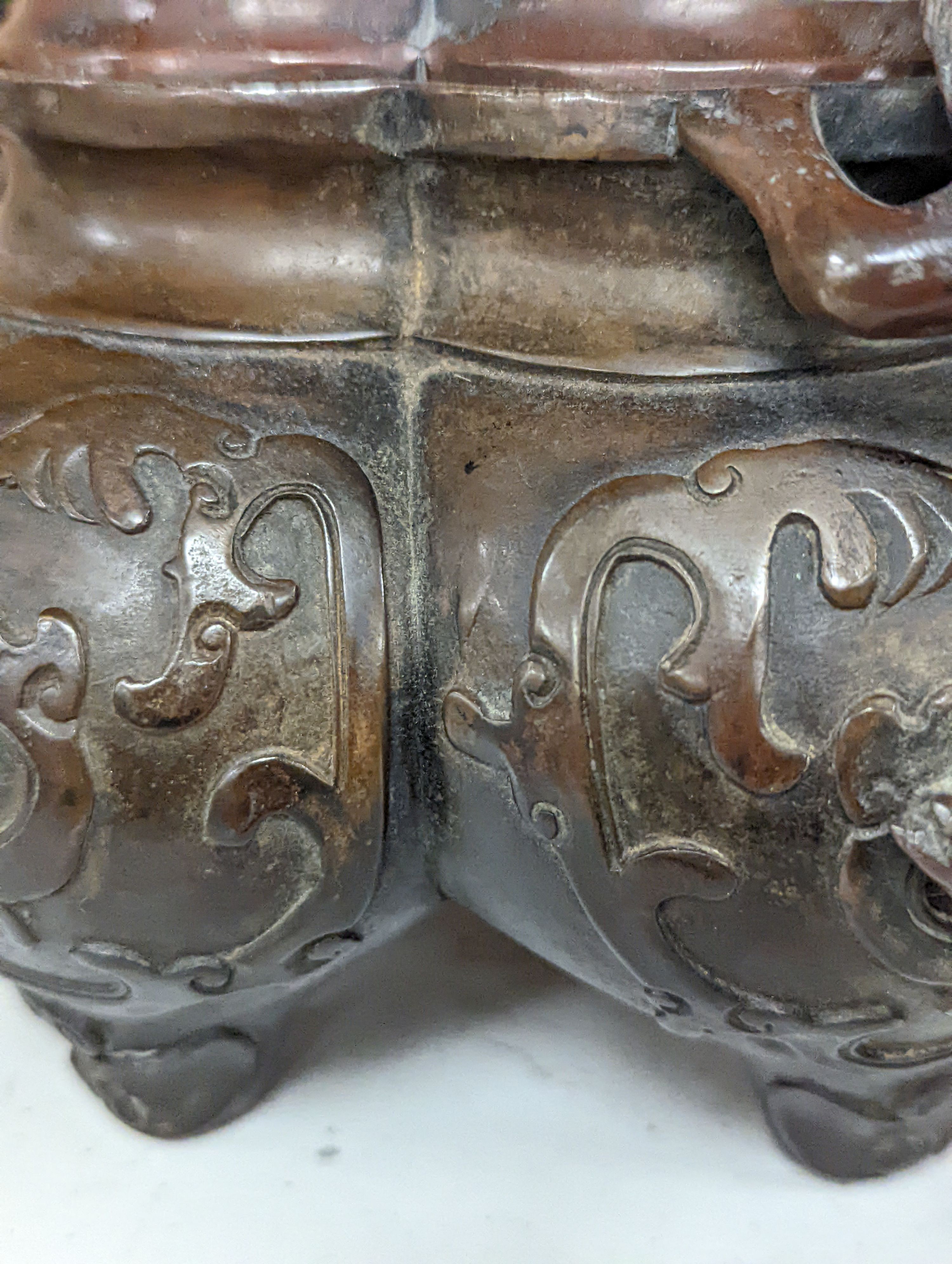 A 19th century Chinese bronze quatrefoil censer, with four character mark - 19cm high